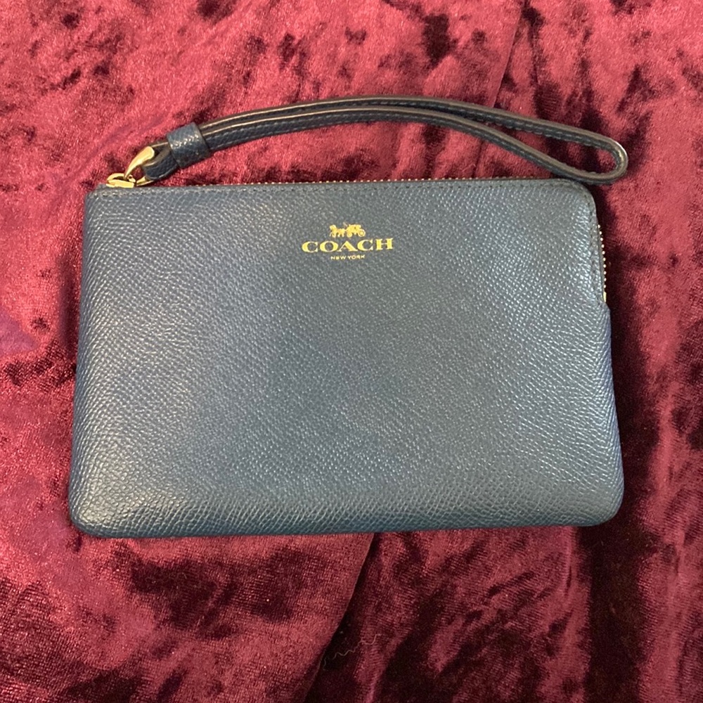 Coach wristlet blue in color Great condition